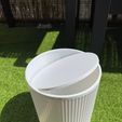 1.jpg Garbage can with swing lid
