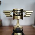 1000005961.jpg CARS movie Piston Cup trophy
