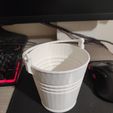 1708448697717.jpg Bucket with handle