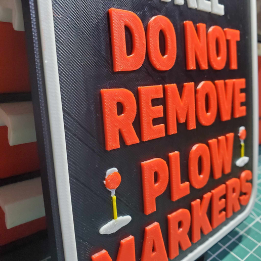 3E50A952-CE6B-4EDB-94F5-FB56E3493B59.png Stone Retaining wall do not remove plow markers - laneway sign