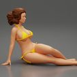 3DG-0002.jpg Femme sexy assise en bikini sur la plage