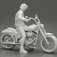 3DG-0009.jpg Young man sitting on his motorbike - Separated and non separated