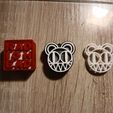 photo_5300954039975612110_y.jpg Radiohead logo keychains