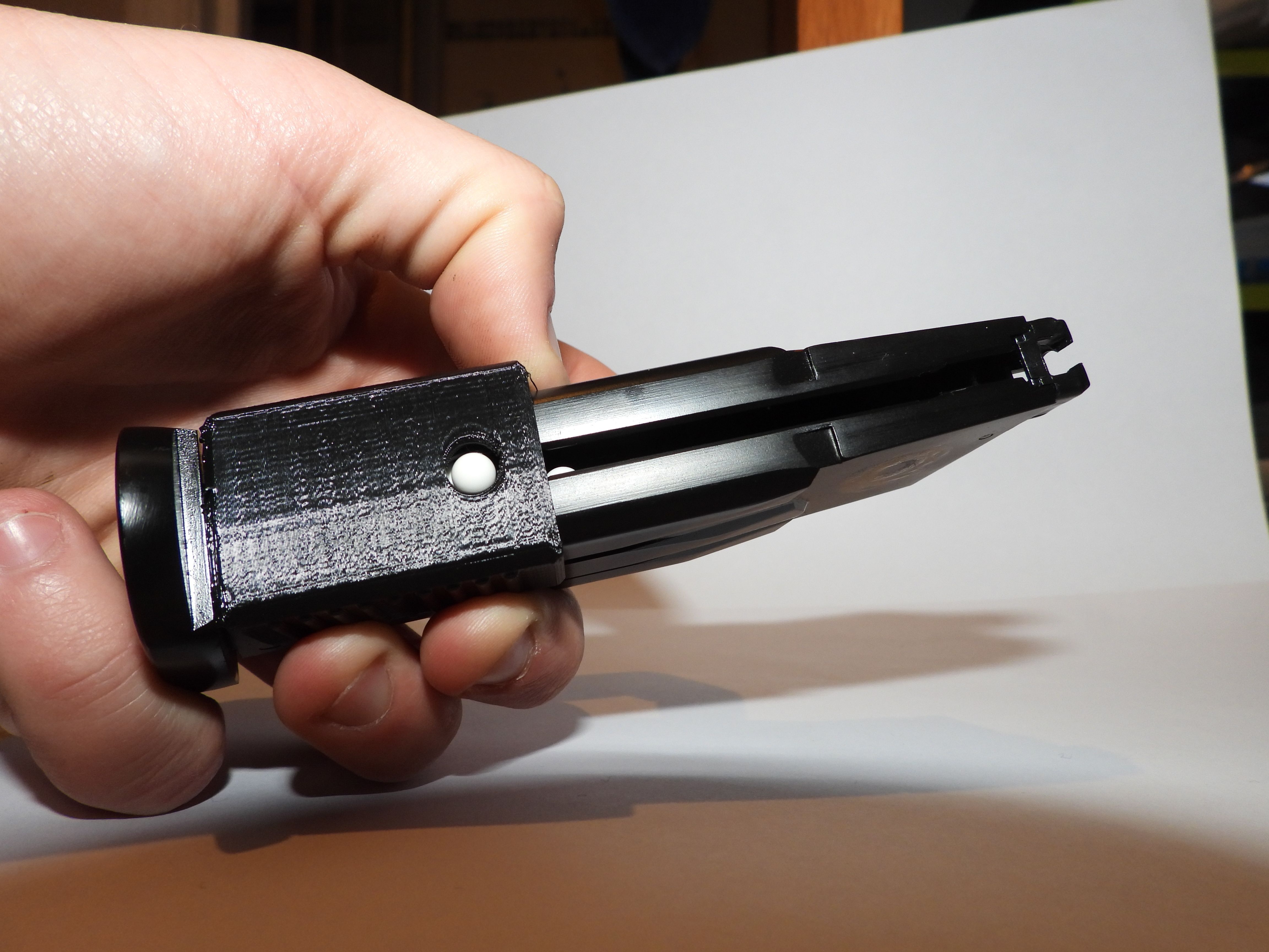 Download STL file Airsoft Mk23 Speed Loader Thumb Saver • 3D printable