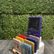 441281243_1382891599772852_615134994366210923_n.jpg GAMEBOY COLOR HOLDER / STAND WITH 8 GAME CARTRIDGES CASES