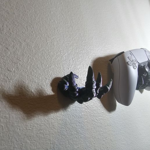 20250413_160450.jpg Dualshock 5 (Playstation 5 controller) wall holder.