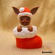 Eevee-in-a-Christmas-Sock.jpg Eevee in a Christmas Sock