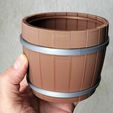 1940ee0e-c16e-401c-ab6c-06f488abb09f.jpg The wine barrel planter