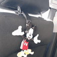 Acc-siège-arrière2.png Mickey Mouse phone holder. Wall or car