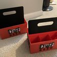 Photo_Jun_25_5_04_33_PM.jpg Duff Beer Carrier 4 pack and 6 pack