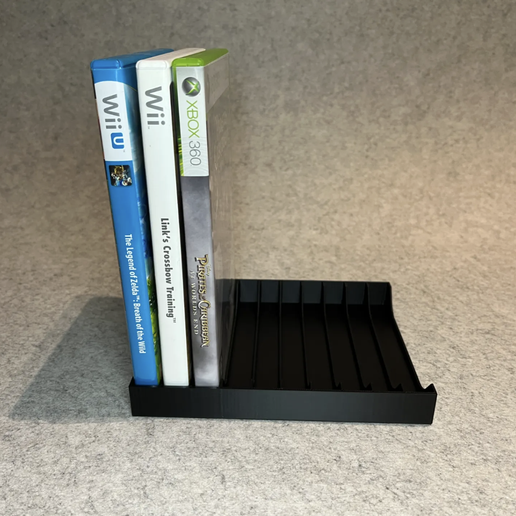 Screenshot-2025-05-24-at-13.57.36.png Simple stand holder for games or DVD