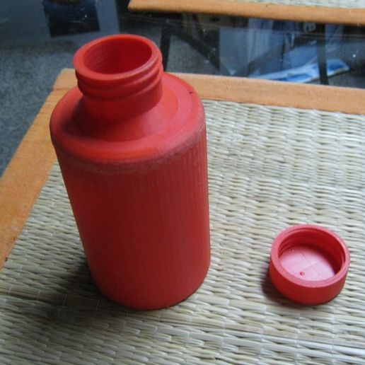 181243cddb1b1641dcc951337c81e3a9_display_large.JPG Bottles and screw cap