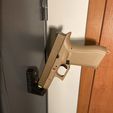 1.jpg MAGNETIC HANGER FOR PISTOLS AND REVOLVERS - 9MM AND UP