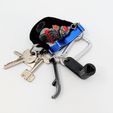 PXL_20240801_082103572.jpg Clé Triangle - mini key ring version (sorting bin/yellow garbage can)