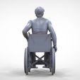 Dis2-.26.jpg N2 Disable man on wheelchair