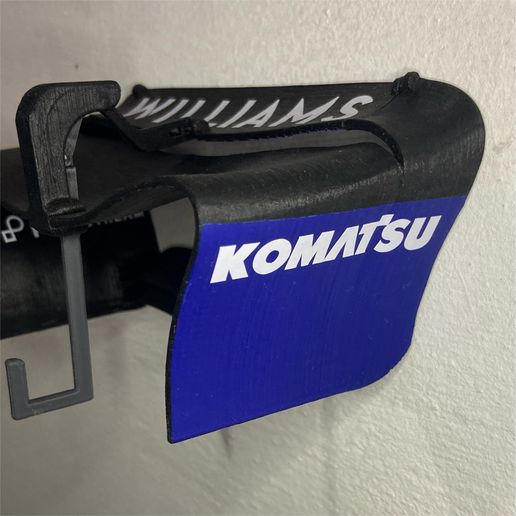 Imagen-de-WhatsApp-2025-02-28-a-las-12.17.34_d9bb1ace.jpg Porte-clés pour le spoiler DRS F1