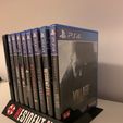 IMG-20230102-WA0006.jpg Stand games residual evil ps2,ps3,ps4 and ps5