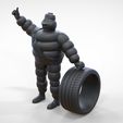 Mim-2.2.3.jpg Michelin man with his tire