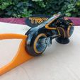 WhatsApp-Image-2024-03-27-at-1.54.31-PM.jpeg TRON LEGACY LIGHT CYCLE 20 FAN ART IN COLORS FOR ENDER 3 PRUSA MK3 FDM
