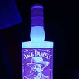 134922188_467082080969555_2274725558687341287_n.jpg Botella de litografía de Jack Daniel's