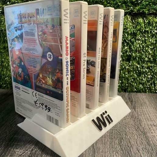 280520457_1394833474367010_2968196421250294037_n.jpg NINTENDO WII GAMES CASES HOLDER