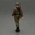Girl-0004.jpg Soldier walking carrying a rifle