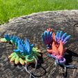 346151628_1695861937531743_8150783965300148122_n.jpg Free STL file Rainbow Dragon Keychain・Design to download and 3D print