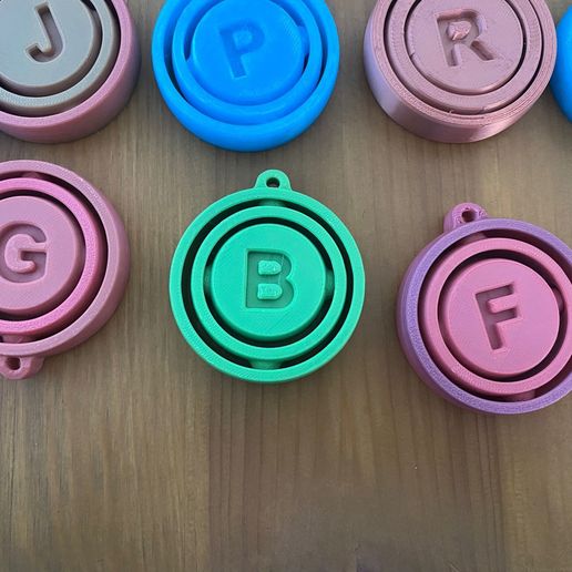 create-names.jpeg Spinning Alphabet Pack STL (A–Z) – Print-in-Place Letter Keychains / Educational Fidget Letters
