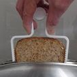 extractor_display_large.jpg Toast Extractor... the safe and easy way to remove toast from a toaster