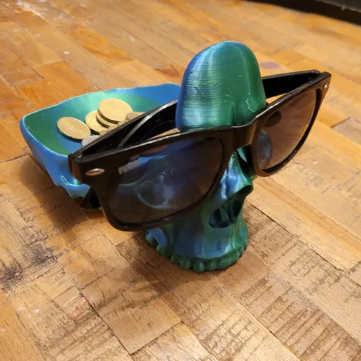 skull-green.png Óculos de caveira e suporte para trocos