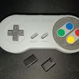 photo_2024-08-30_22-07-18-3.jpg SUPER NINTENDO KEYCHAIN AND HOLDER