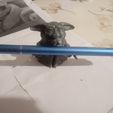 20210528_222815.jpg Baby Yoda offers you a pen.