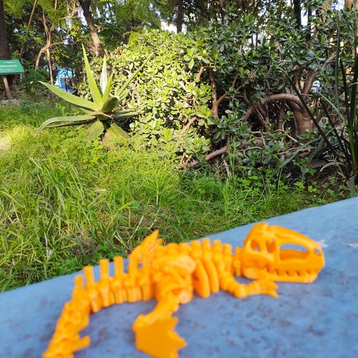 Yellow_flexi_giganotosaurus.jpg Flexi Giganotosaurus skeleton by Flexmex3dlab