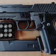 Pistolet à élastique à soufflage et éjection d'obus (Sig Sauer P226)
