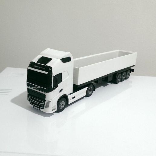 IMAG7270.jpg CAMIÃO VOLVO E REBOQUE DE CARGA