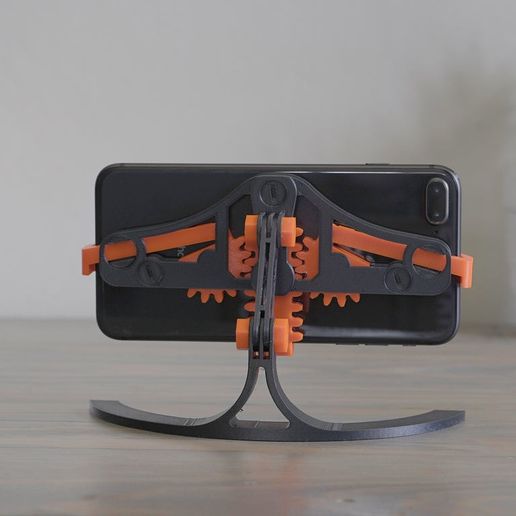 10f76bf244a745672052bce9ee04a740_display_large.jpg Mechanical Quick Grab/Release Phone Stand