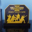 WhatsApp-Image-2024-02-29-at-16.42.58-1.jpeg Helldivers II Table stand "EARN YOUR CAPE"