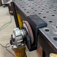 PXL_20250422_113644946.jpg Holder for Angle Grinders on top of the table
