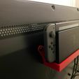 IMG_0615.jpeg Nintendo Switch stand or support back TV