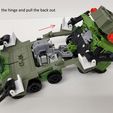 raise the front on the hinge and pull the back out Rolling Thunder OP Legacy Bulkhead upgrade kit