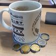 20240205_133512.jpg Cup holder with coins