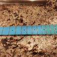 dadee16b-c043-4742-8df5-3b11d5e8ac18.jpg Multiscale guitar fretboard