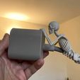 skeleton.jpeg Skeleton Cable Buddy – Articulated 3D Printed Cable Protector