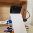 215924996_4160914330654001_6517832597572912954_n.jpg Suporte para telemóvel e tablet.