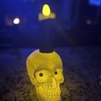 d9b72bc5-12e6-412e-9990-308ea294320a.JPG Lighted skull w/ eyes that follow (Remix)
