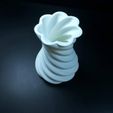 720X720-00f313abe792abe4c993268397b28972170bee4b.jpg FREE: The 'Nautilus Bloom' Vase