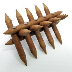 spikewall.jpg Fichier STL gratuit Barricade à pointes en bois pour table de 28mm・Modèle imprimable en 3D à télécharger