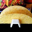 d6bee519d1f88771dd70be9cd0fd8b54_display_large.jpg Taco Holder - Rolls over for easy filling / Flat base holds Taco upright when served