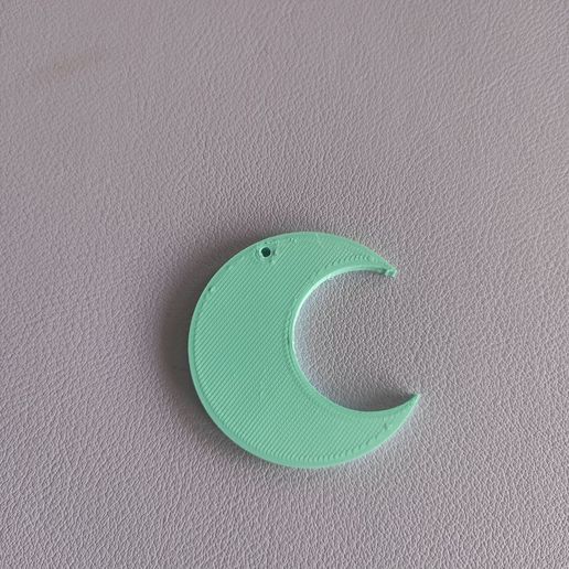 photo_6012643766030154572_y.jpg Mondsichel-Ohrring