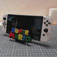 Halterung-mit-Switch.jpg Mario Nintendo Switch Bracket